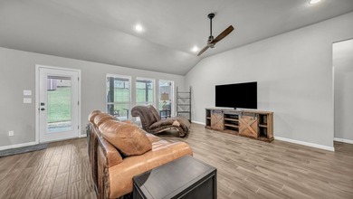 This stunning home is in pristine condition and sits on an - photo 10