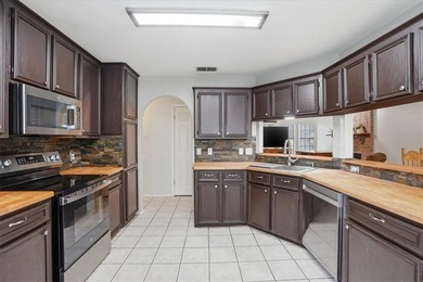 Welcome to 7310 Elm Hollow Dr., a spacious 4-bedroom, 3-bath - photo 11