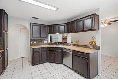 Welcome to 7310 Elm Hollow Dr., a spacious 4-bedroom, 3-bath - photo 12