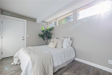 Wake up to tranquil waterfront views in this beautifully updated - photo 15