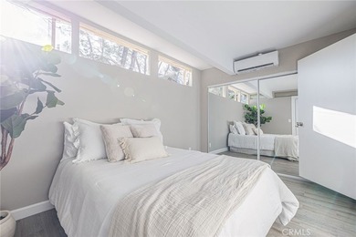 Wake up to tranquil waterfront views in this beautifully updated - photo 16