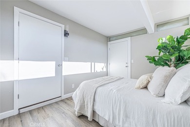 Wake up to tranquil waterfront views in this beautifully updated - photo 17