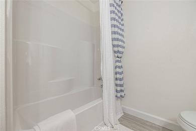 Wake up to tranquil waterfront views in this beautifully updated - photo 20