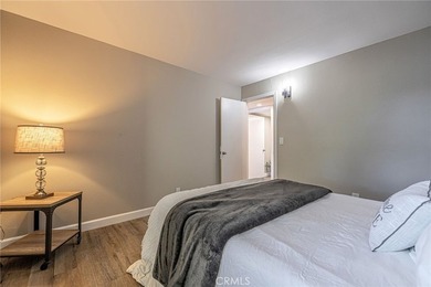 Wake up to tranquil waterfront views in this beautifully updated - photo 22