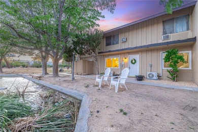Wake up to tranquil waterfront views in this beautifully updated - photo 24