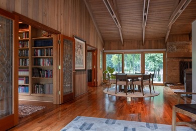 Nestled on more than 80 pristine acres of mature hardwood forest - photo 31