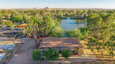 Wake up to tranquil waterfront views in this beautifully updated - photo 32