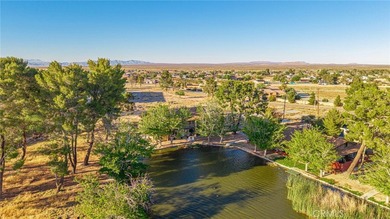 Wake up to tranquil waterfront views in this beautifully updated - photo 33