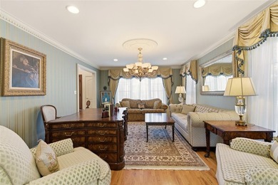 FLOWER HILL, ROSLYN | BRICK CENTER HALL COLONIAL. Located on a - photo 5