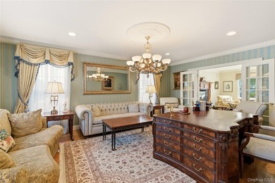FLOWER HILL, ROSLYN | BRICK CENTER HALL COLONIAL. Located on a - photo 6