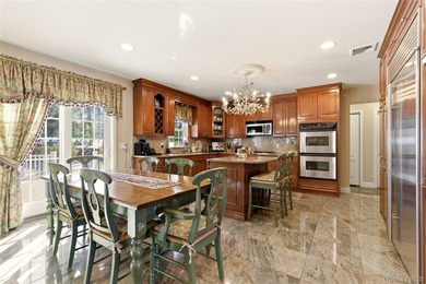 FLOWER HILL, ROSLYN | BRICK CENTER HALL COLONIAL. Located on a - photo 10