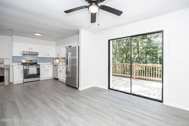 Stunning newly renovated white brick home in DOWNTOWN GOLF CART - photo 13