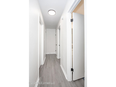 Stunning newly renovated white brick home in DOWNTOWN GOLF CART - photo 23