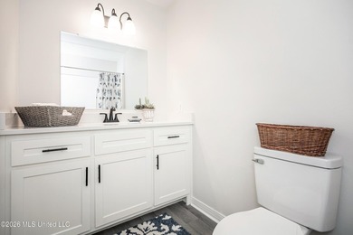 Stunning newly renovated white brick home in DOWNTOWN GOLF CART - photo 24