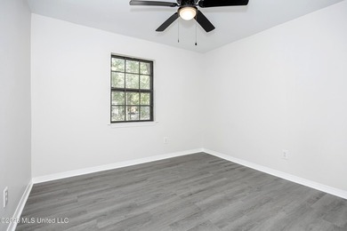 Stunning newly renovated white brick home in DOWNTOWN GOLF CART - photo 26