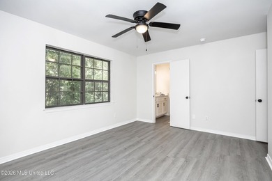 Stunning newly renovated white brick home in DOWNTOWN GOLF CART - photo 29