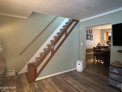 This contemporary 4-bedroom, 2-bath home blends clean modern