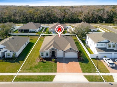 Former Model Home - Situated in Elegant Manor Estates, you will - photo 3