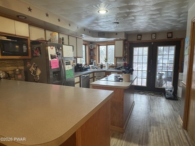 This contemporary 4-bedroom, 2-bath home blends clean modern