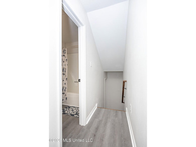 Stunning newly renovated white brick home in DOWNTOWN GOLF CART - photo 35