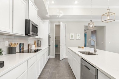 Former Model Home - Situated in Elegant Manor Estates, you will - photo 8
