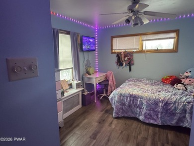 This contemporary 4-bedroom, 2-bath home blends clean modern