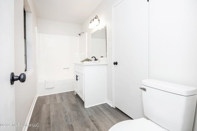 Stunning newly renovated white brick home in DOWNTOWN GOLF CART - photo 46