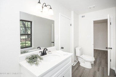 Stunning newly renovated white brick home in DOWNTOWN GOLF CART - photo 47