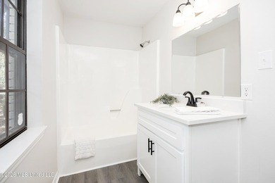 Stunning newly renovated white brick home in DOWNTOWN GOLF CART - photo 48