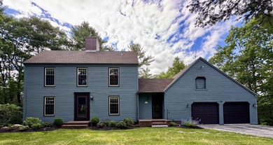 Set on a peaceful 2.25-acre lot in Yarmouth off Route 88, near - photo 1