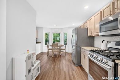 This 3 story townhouse is located in the Kensington Woods - photo 11