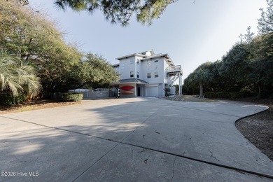 Experience exceptional coastal living in this stunning 8-bedroom