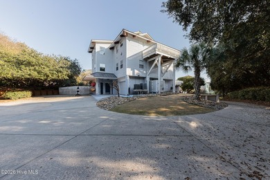 Experience exceptional coastal living in this stunning 8-bedroom
