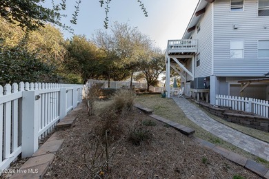 Experience exceptional coastal living in this stunning 8-bedroom