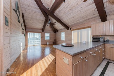 Experience exceptional coastal living in this stunning 8-bedroom