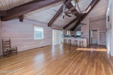 Experience exceptional coastal living in this stunning 8-bedroom