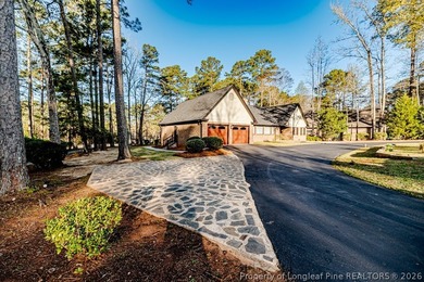 Experience golf course living at its finest in this custom-built - photo 1