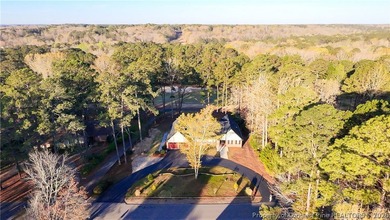 Experience golf course living at its finest in this custom-built - photo 2