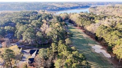 Experience golf course living at its finest in this custom-built - photo 3