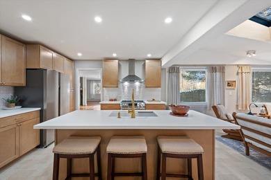 Stunning mid-century remodeled home offering five spacious - photo 14