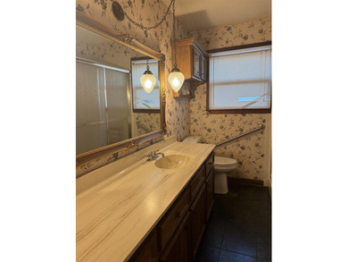 This 3 bedroom, 2 bath home offers excellent potential for