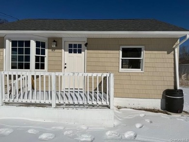 17 Bayport Road, Mastic Beach is a quiet and serene two-bedroom - photo 1