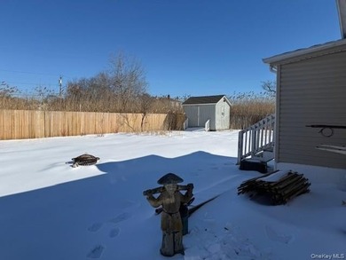 17 Bayport Road, Mastic Beach is a quiet and serene two-bedroom - photo 10