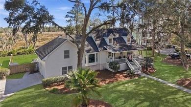 Welcome to 87 Marsh Oak Drive, a beautifully updated 4-bedroom - photo 6