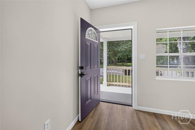 WELCOME HOME TO THIS LOVELY 3 BEDROOM 2 BATH EQUIPPED WITH ALL - photo 5