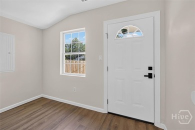 WELCOME HOME TO THIS LOVELY 3 BEDROOM 2 BATH EQUIPPED WITH ALL - photo 6