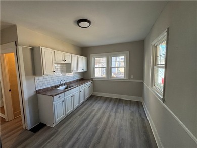 Check out this side-by-side duplex in North Winton Village! With - photo 11