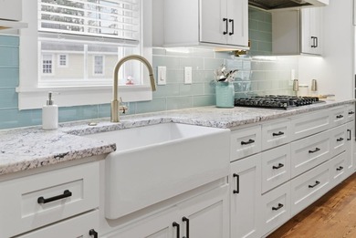 Experience elevated Low-country living at 613 Collins Creek