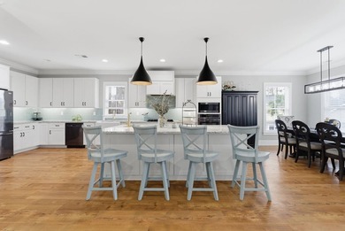 Experience elevated Low-country living at 613 Collins Creek