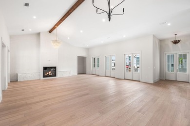 A showstopper of modern coastal elegance, 36 Sandcord Drive is a - photo 12